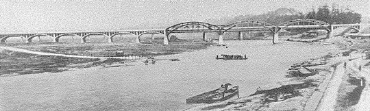 丸子の渡しと完成した丸子橋（昭和10年5月）東京側より上流のようす